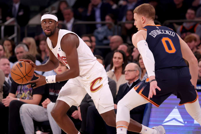 Nov 1, 2023; New York, New York, USA; Cleveland Cavaliers guard Caris LeVert (3) controls the ball against New York Knicks guard Donte DiVincenzo (0) during the first quarter at Madison Square Garden.